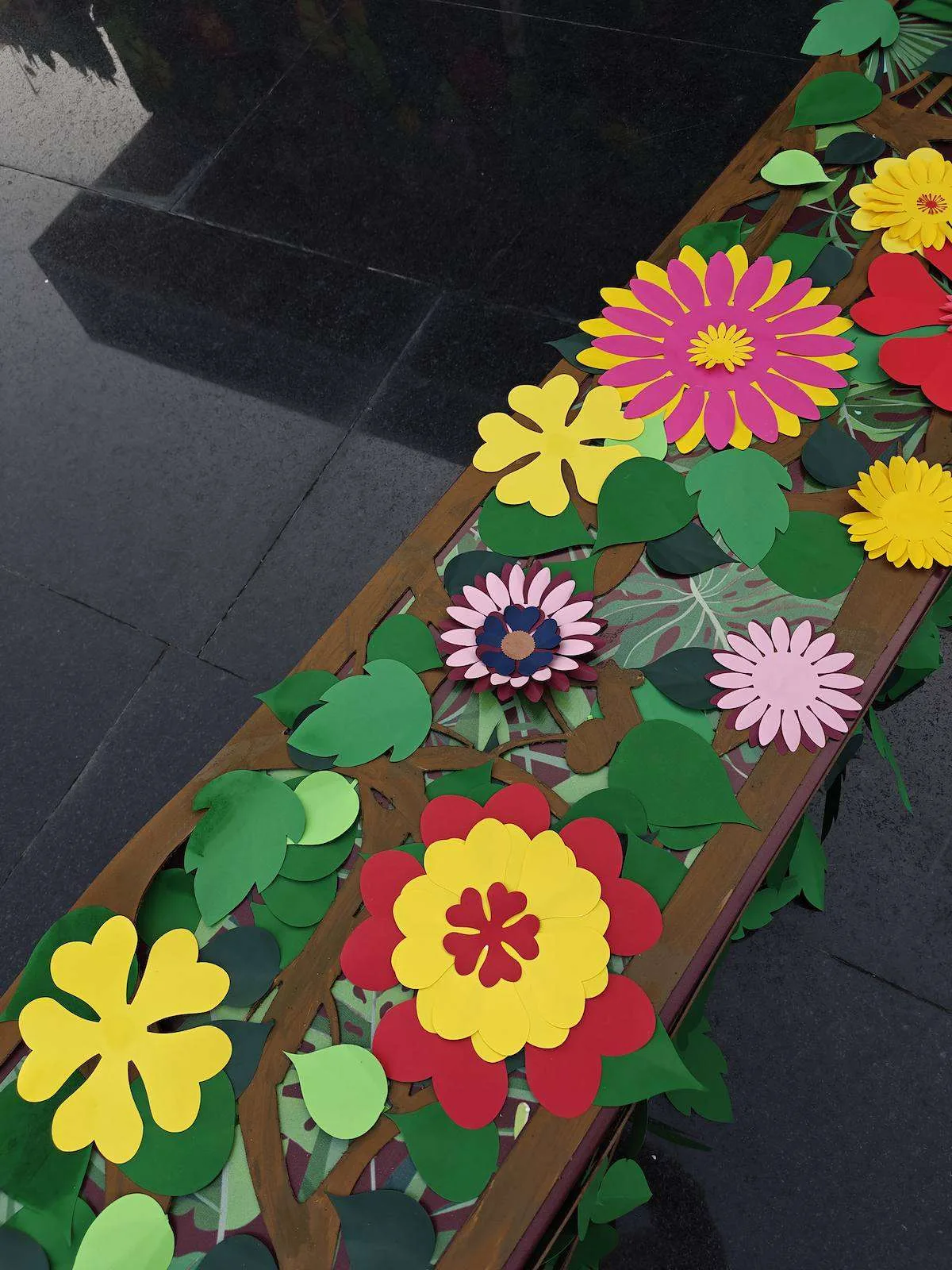 Paper flower border spelling Save the Earth