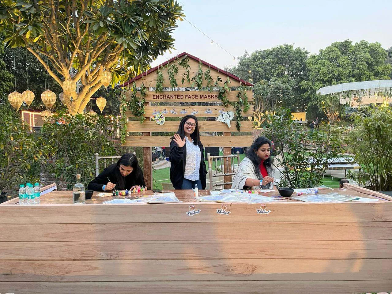 Arcesium family day craft stall in a garden