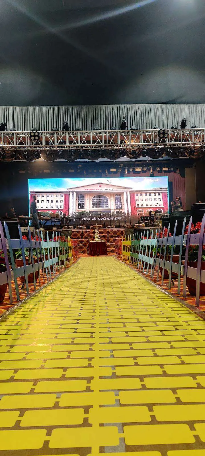 Yellow brick road built down the auditorium aisle