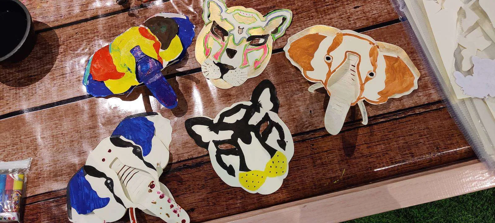 Painted paper animal masks made by children