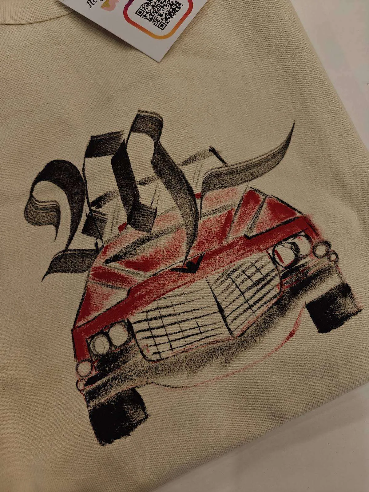 Hand-lettered T-shirt with a calligraphy initial and vintage car
