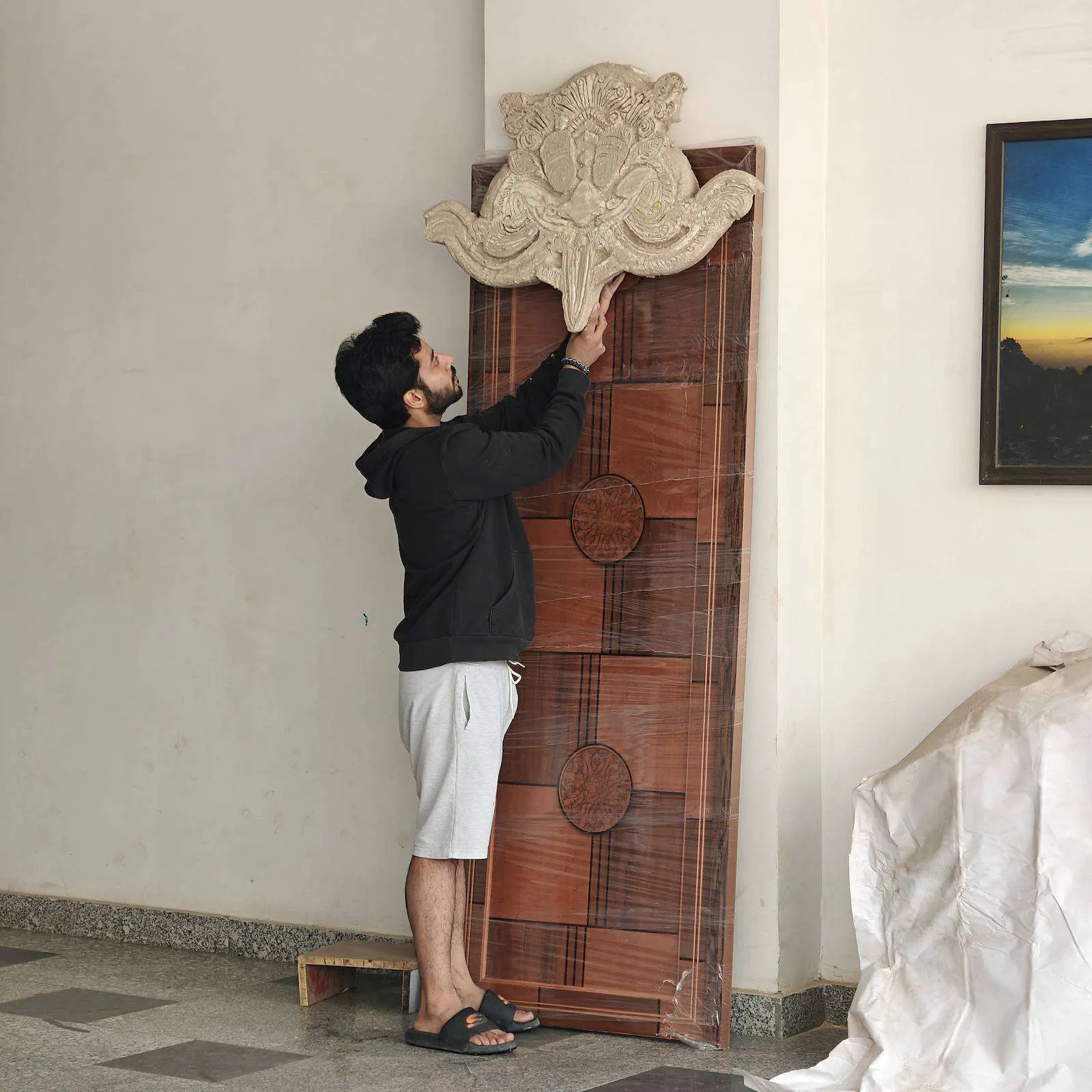 Mounting the Kirtimukh relief on a wall
