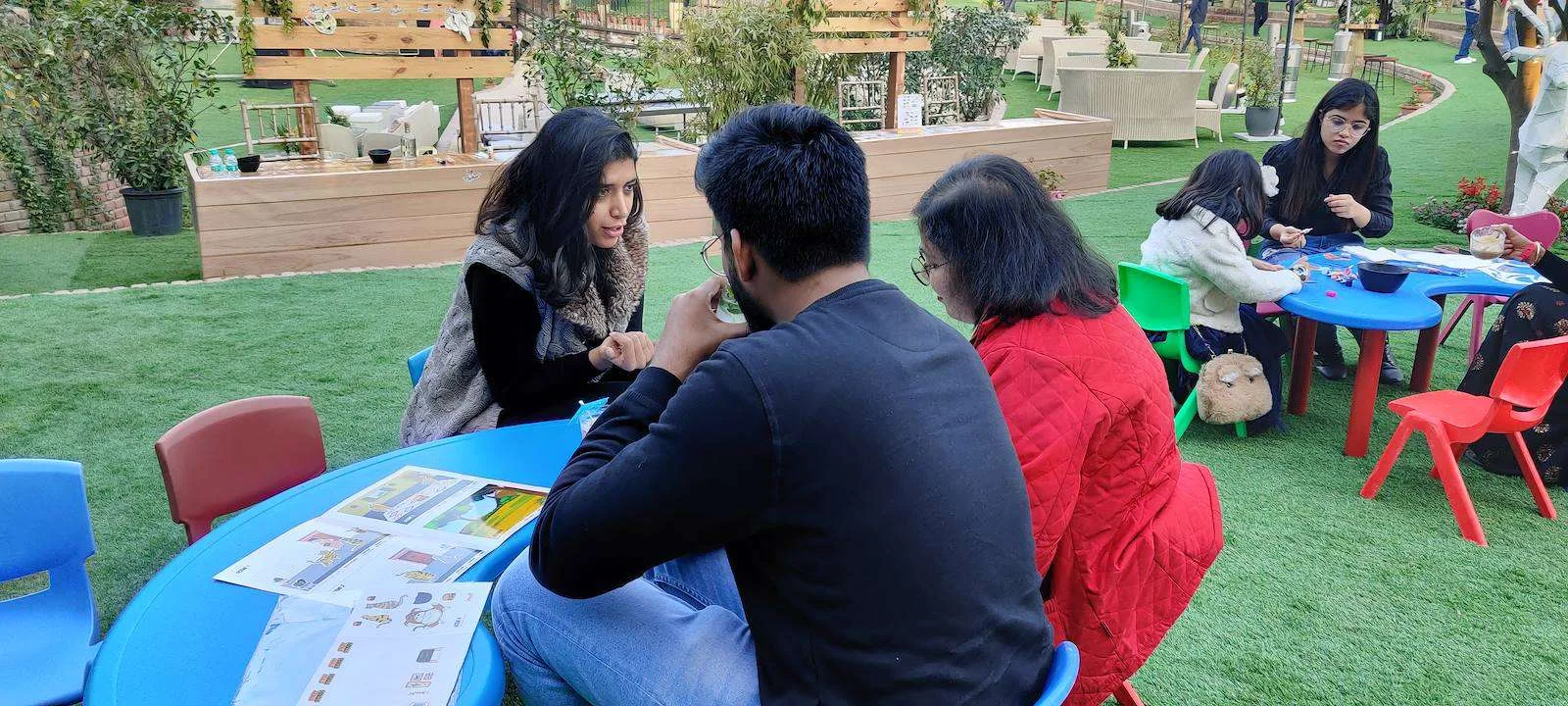 Families taking part in outdoor craft activities