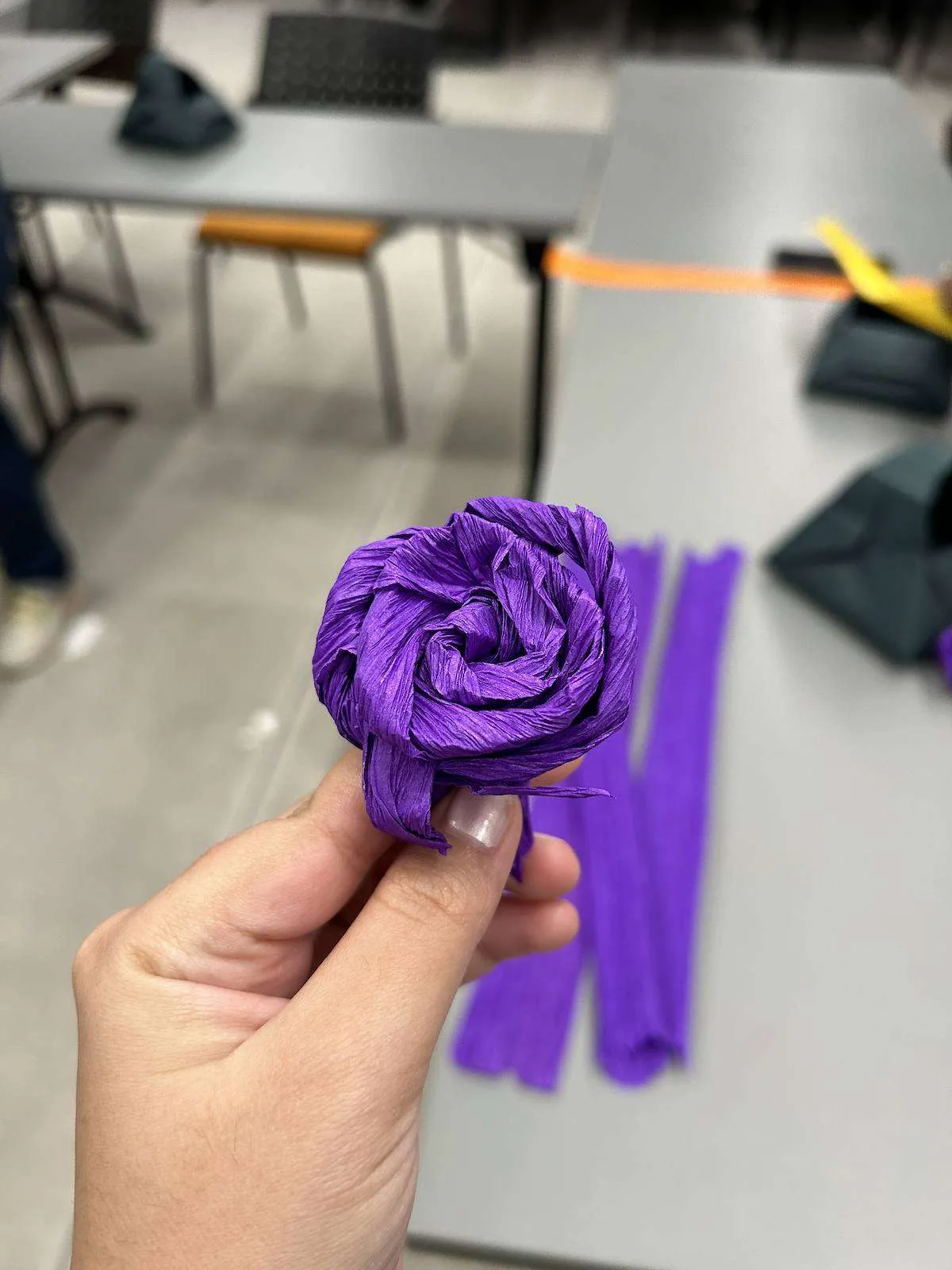 Hand-rolled purple paper rose
