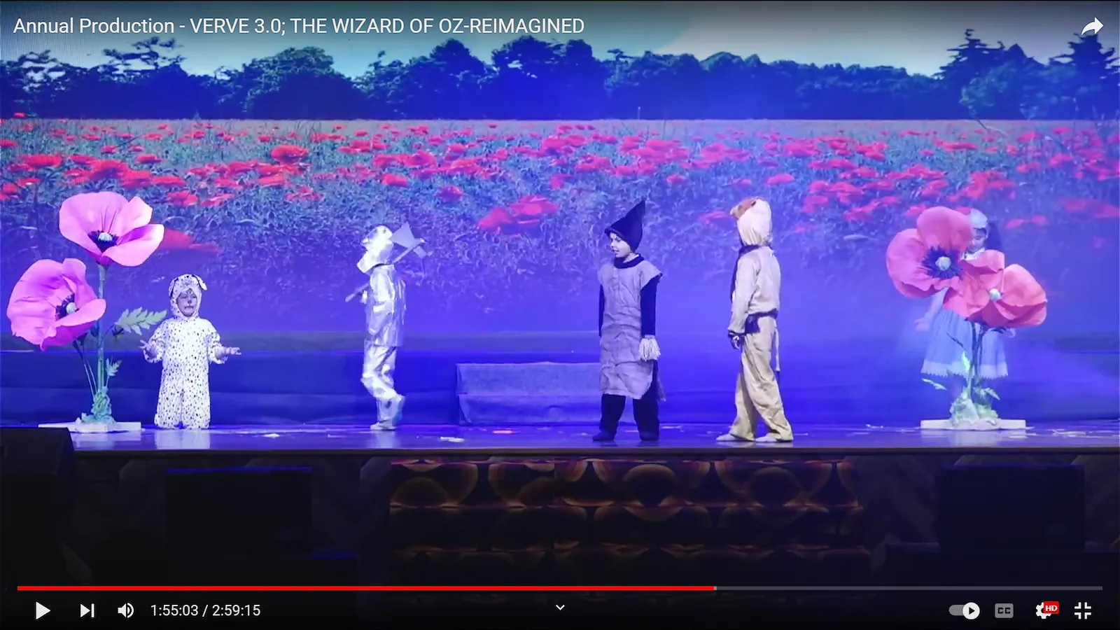 Giant paper poppies on stage during the school play