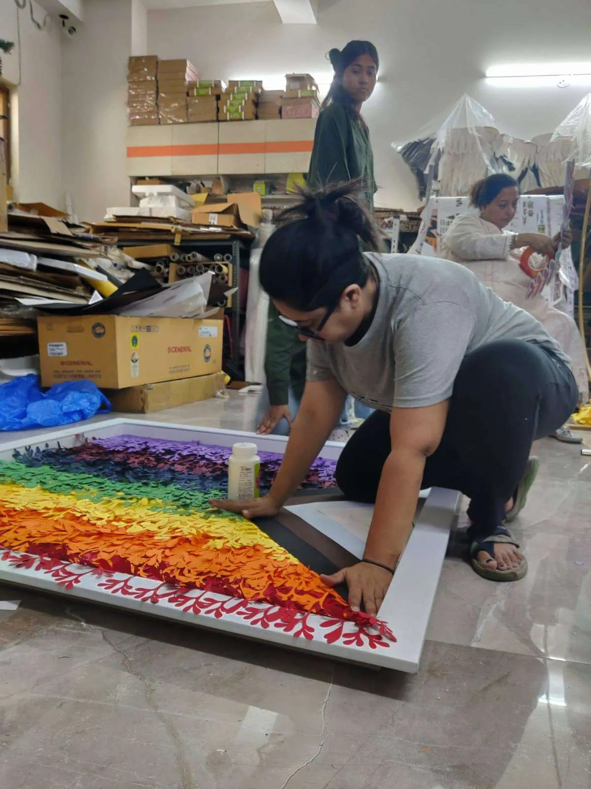 Messketeers team assembling the Pride mosaic