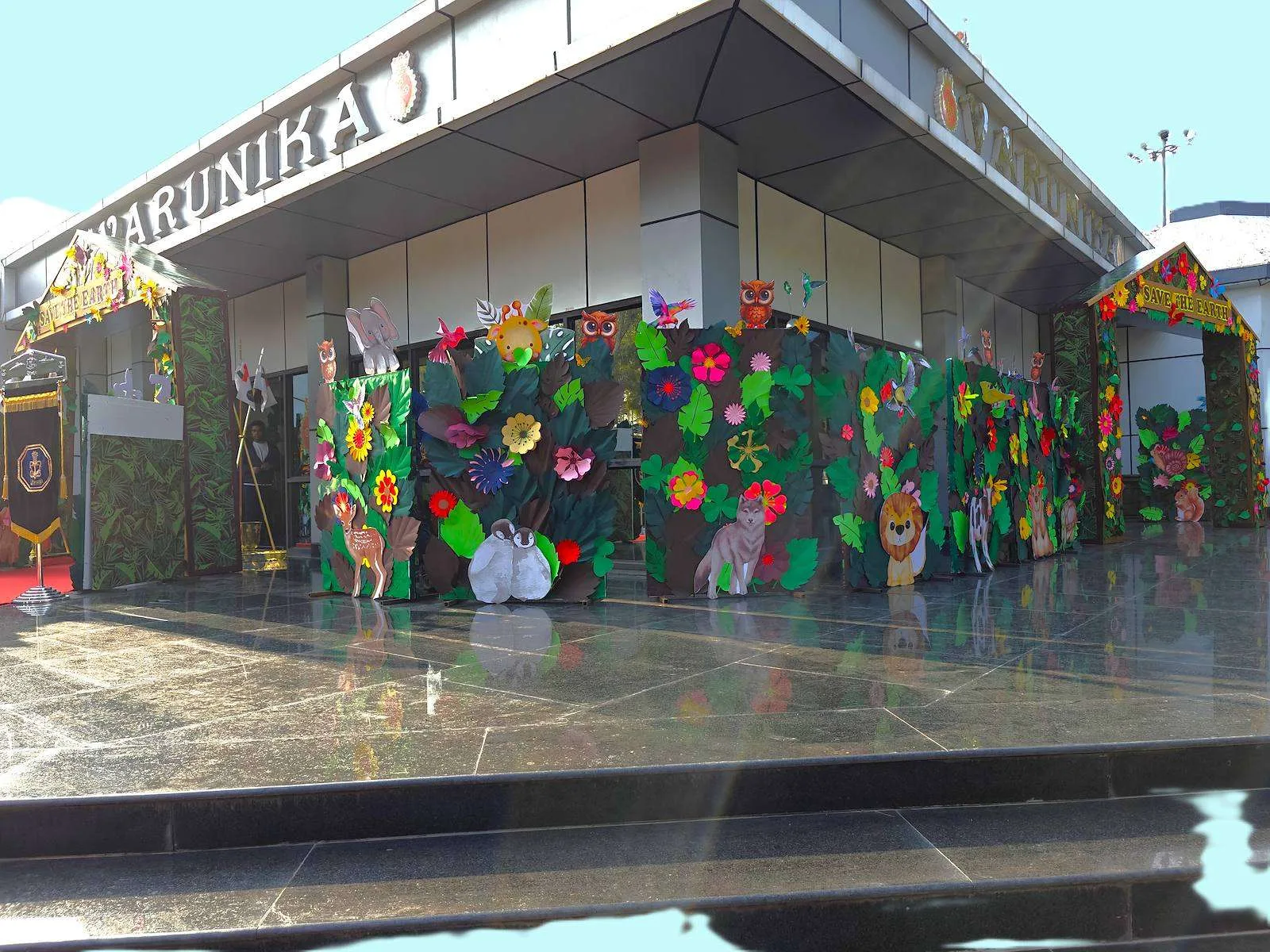 Varunika building facade covered in paper foliage