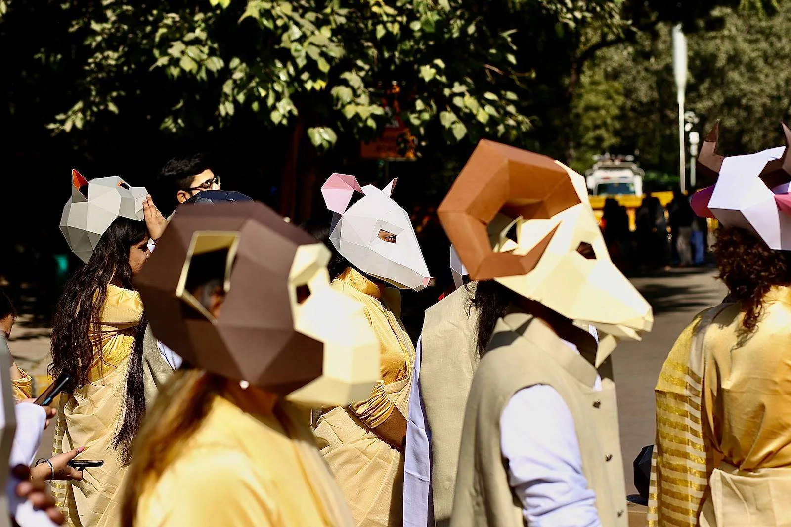 Campaigners lining up in paper animal masks