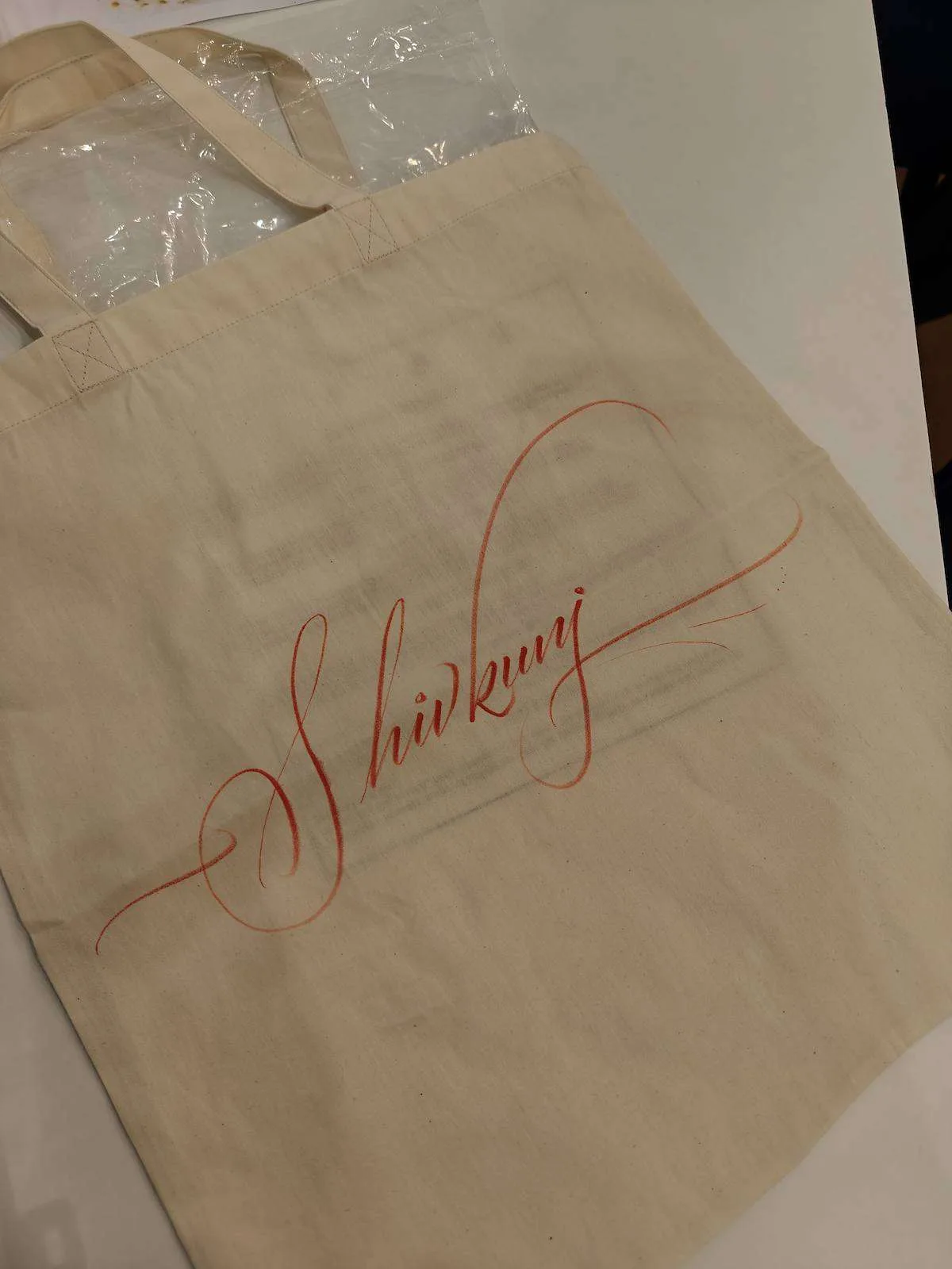 Personalised script calligraphy on a tote bag